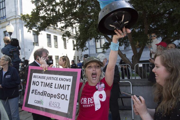 Activist Bird Milliken reacts as Bill Cosby leaves the Montgomery County Courthouse after being found guilty of sexual assault.