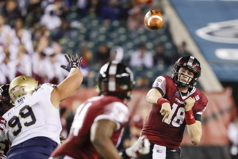 Temple quarterback Frank Nutile throws the football to Temple tight end Kenny Yeboah during the fourth-quarter against Navy on Thursday, November 2, 2017 in Philadelphia. YONG KIM / Staff Photographer
