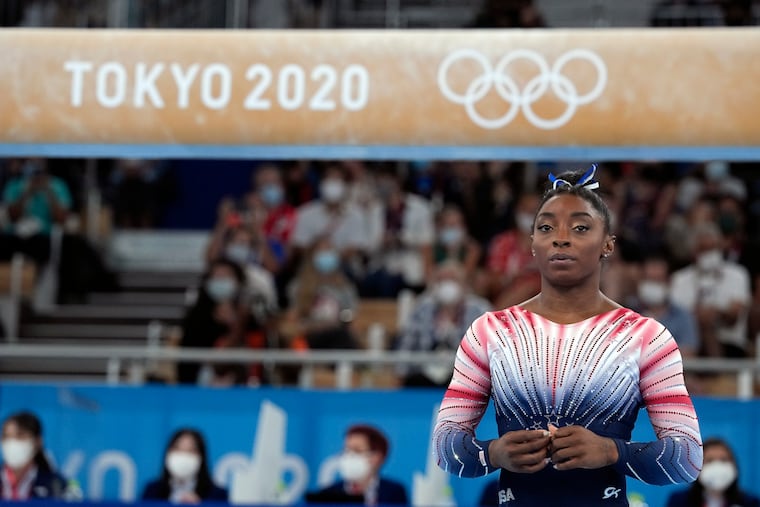 Simone Biles, of the United States, waits to perform on the balance beam during the artistic gymnastics women's apparatus final at the 2020 Summer Olympics, Aug. 3, 2021, in Tokyo, Japan. Thanks to celebrities like Naomi Osaka, Simone Biles and Ben Simmons, the discussion of mental health issues has become more commonplace than ever before.