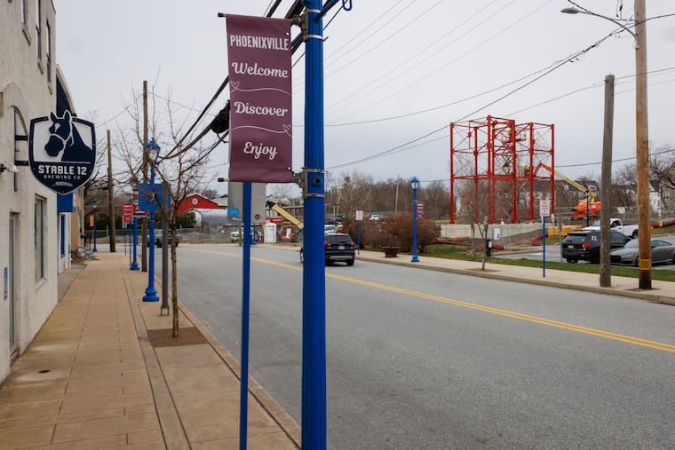 The Phoenix Wheel, which was created in Phoenixville 133 years ago, is being rebuilt on Bridge Street by borough hall.