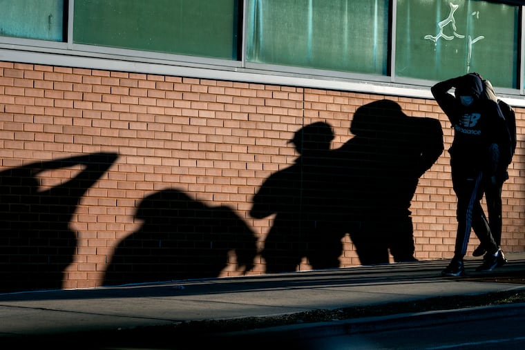 March 6, 2023: Long wintertime shadows along a wall in Frankford.