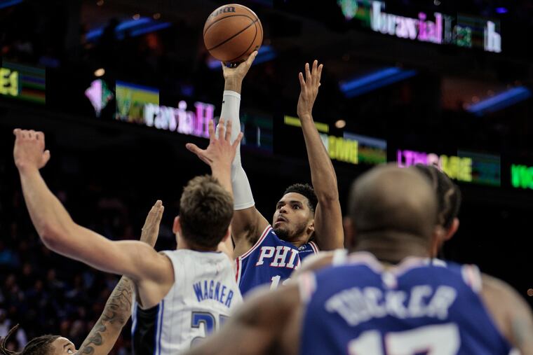 Sixers Tobias Harris shoots over Magic Franz Wagner during the second quarter action at the Wells Fargo Center. The Sixers won 105-94.