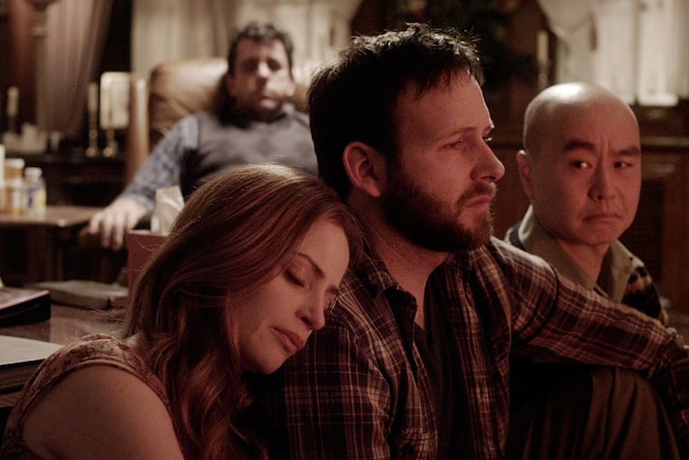 Jaime Ray Newman as Julie Shellner, Ryan O'Nan as Tommy Shellner, and C.S. Lee as Harry Shellner, and Joseph Lyle Taylor as Leonard Shellner (rear) in "Altered Minds."