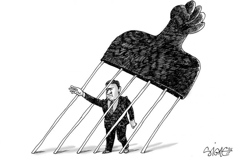 Earlier this year, as part of a public art project, a giant sculpture of an afro pick was placed next to the controversial Frank Rizzo statue. Signe Wilkinson captured the moment with this cartoon.