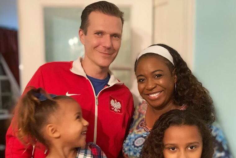 Bethany Watson-Ostrowski with her family, including daughters Julie (left) and Lilly (right).