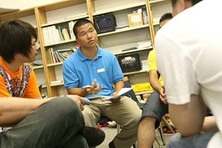 At a training session last week on harassment, Xu Lin (center), one of the leaders, said, “I want the students to be prepared.” (CHARLES FOX / Staff Photographer)