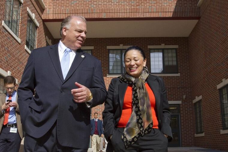 Gloria Bonilla-Santiago, founder of LEAP Academy University Charter School, gives Senate President Steve Sweeney a tour of the school in 2014.