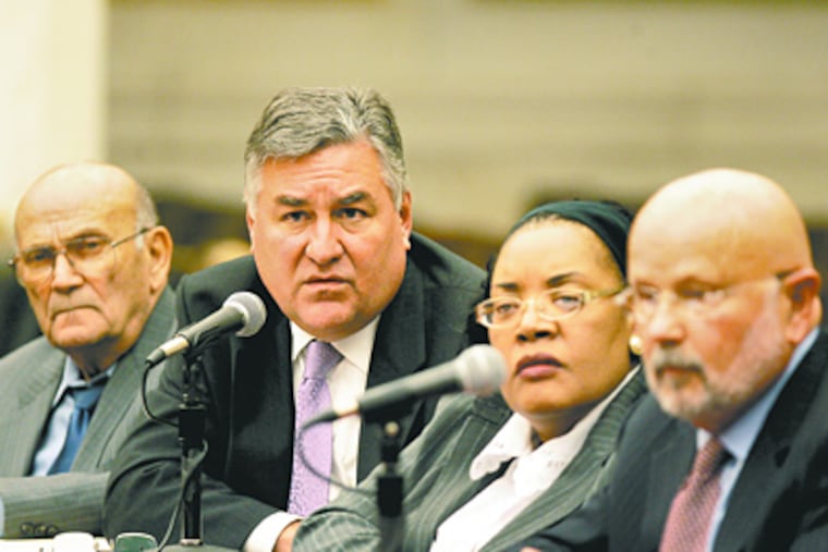(From left to right) Erico Foglia, Barry Mescolotta Charlesretta Meade and HarryLevin answer question in City Council chambers. ( David Swanson / Staff Photographer )