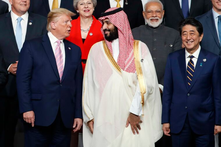 U.S. President Donald Trump speaks with Saudi Arabia's Crown Prince Mohammed bin Salman during a photo session at the G-20 leaders summit in Osaka, Japan, Friday, June 28, 2019.