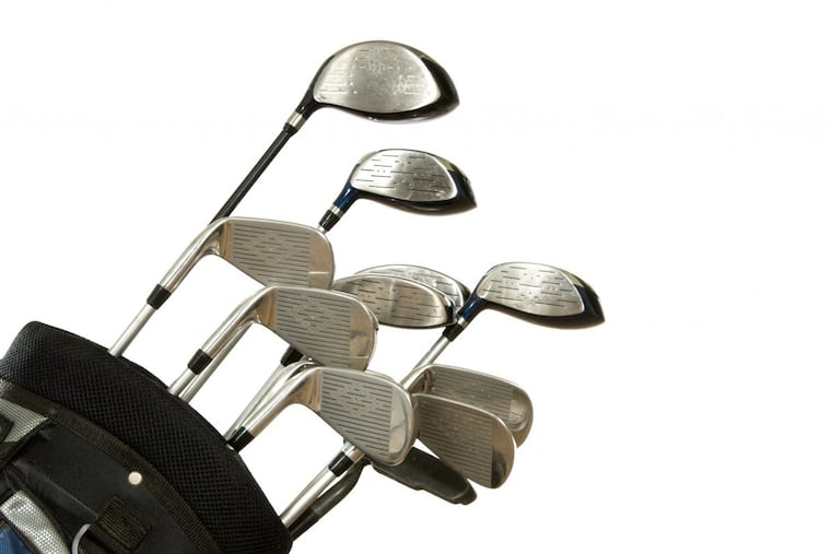 full set on golf clubs in a bag on white backgrund