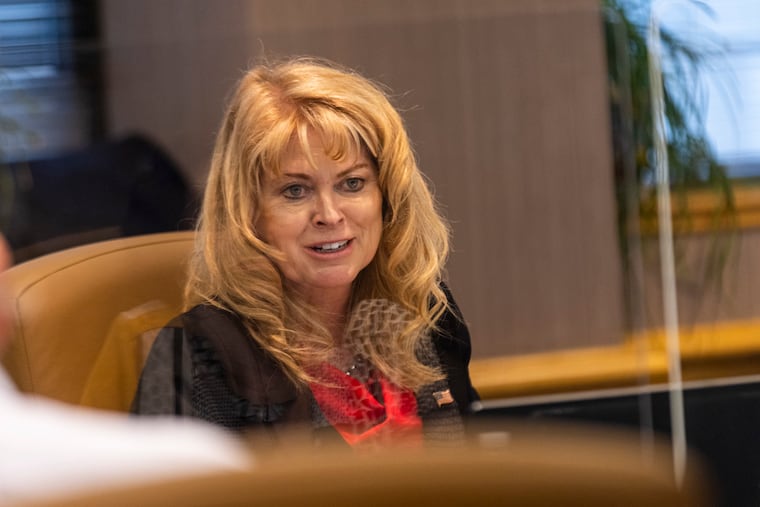Republican State Treasurer Stacy Garrity listens in during a main board room meeting at the PSERS offices in Harrisburg last month.