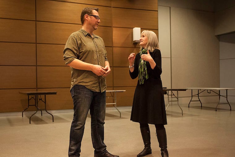 Frank Daly of American Paddy’s Productions and Katherine Ball-Weir, the Institutional Advancement Director at the Archmere Academy, look at the space that will be filled with people for the first-ever Philadelphia Sober Saint Patrick’s Day Celebration on March 15, 2015, at WHYY Public Media Commons. (CHRIS FASCENELLI / Staff Photographer)