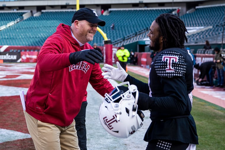 Temple Owls head coach Rod Carey hugs Temple Owls safety Amir Tyler for senior night before their last home game against Navy Midshipmen at the Lincoln Financial Field in Philadelphia, Pa., on Saturday, Nov. 27, 2021.
