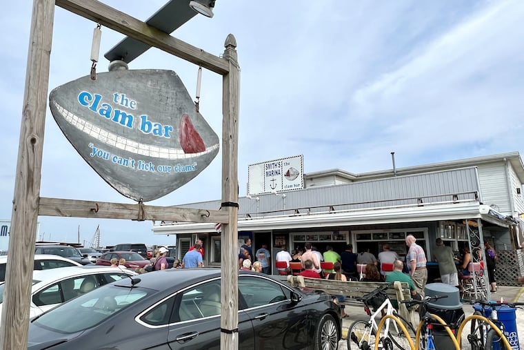 The late-afternoon crowd builds at the Clam Bar, also known as Smitty's, in Somers Point, N.J., on Aug. 25, 2022.