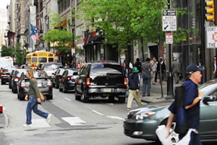 Intercection of 16th and Chestnut, where traffic often jams despite sign on traffic light at right. (SARAH J. GLOVER / Staff photographer)