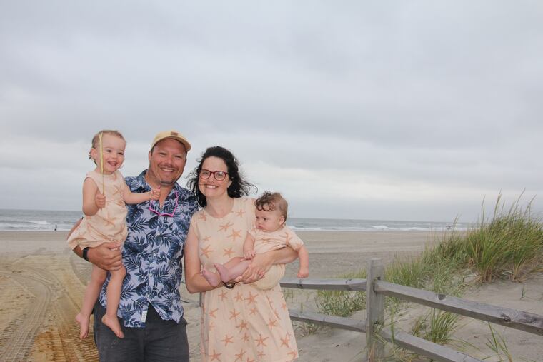 Ben and Sarah with daughters Claire, left, and Emma.