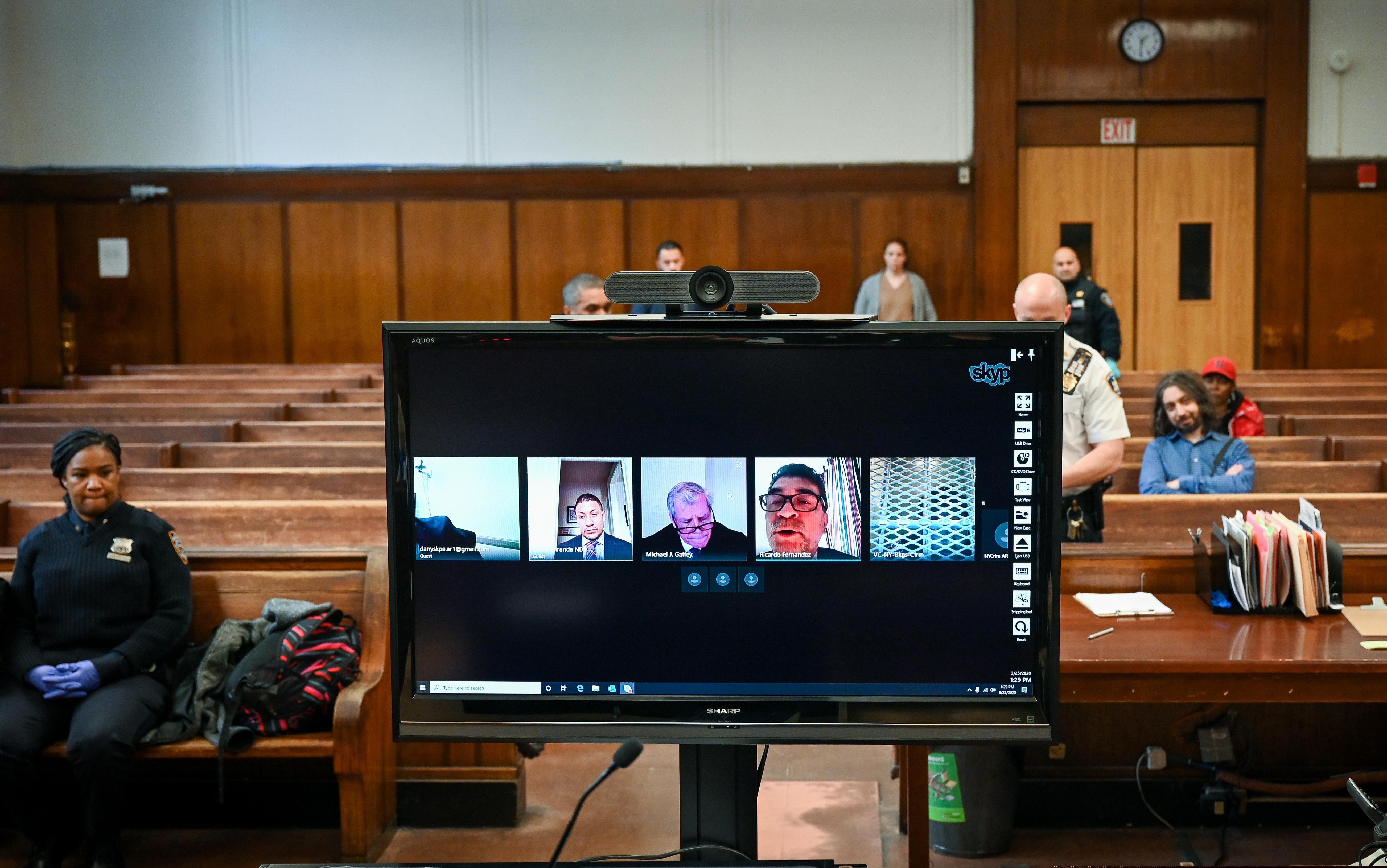 A virtual arraignment is conducted in New York.