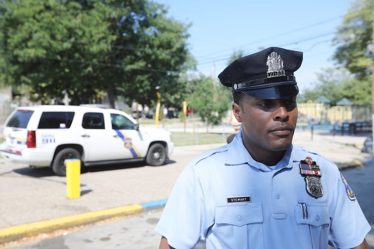 Police officer G. Lamar Stewart at a news conference, outside Mill Creek Recreation Center Thursday, Sept. 6, announcing that Philadelphia's Southwest Police Division will transform heavily populated street corners into job interview sites on the first Friday of every month.