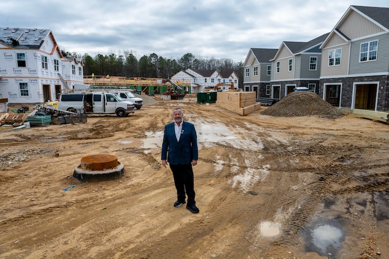 Hans Lampart amid new construction of rental townhouses with garages at his Winslow Cross Creek development in Camden County. He is the founder, president, and CEO of Eastern Pacific Development and Brookfield Construction, which specializes in build-to-rent affordable housing.