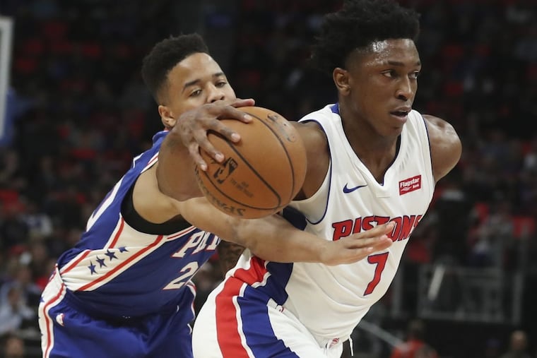 Sixers’ guard Markelle Fultz tries to steal the ball from Pistons forward Stanley Johnson during the Sixers’ win on Wednesday.