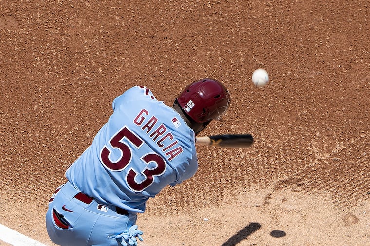 Adolis García hits his first home run since May 6 in the fifth inning on Thursday.