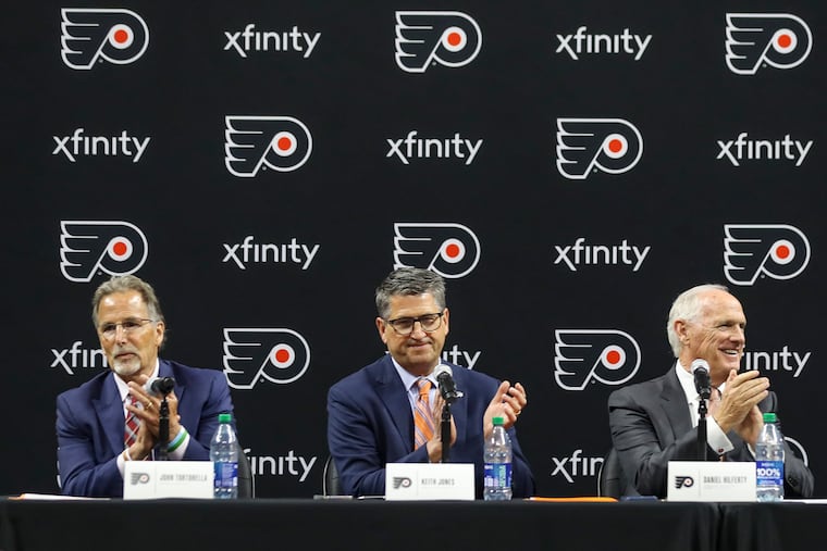 Keith Jones (center), and Dan Hilferty (right) have played a major role in a more transparent and hands-on Flyers' leadership group.