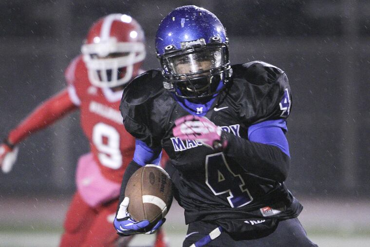 Mastery North’s Armani Fuller-Williams looks for running room in third quarter against Gratz.