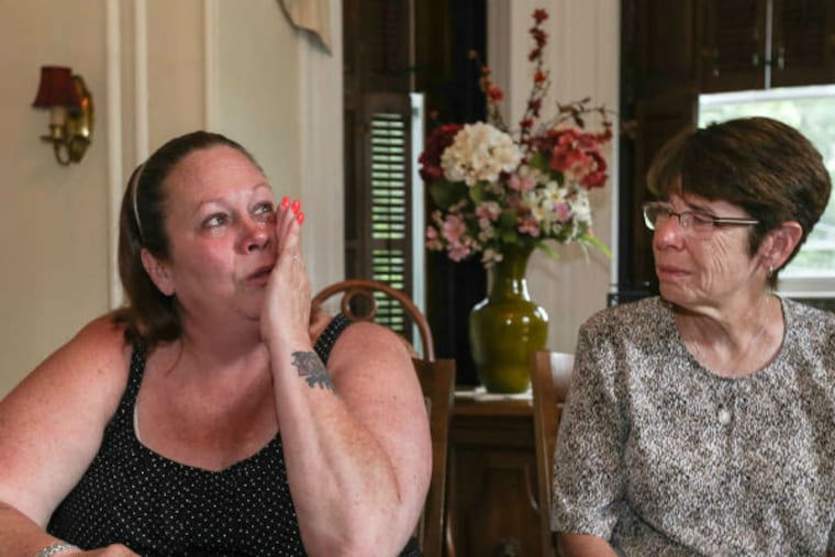 Sister Mary Scullion (right) listens to Anne Marie Jones tell her story at Dawn's Place. The program hopes for $100,000 from the Francis Fund. (Steven M. Falk / Staff Photographer)
