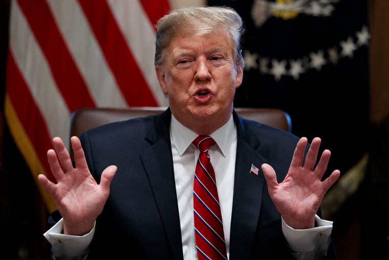 President Donald Trump speaks during a cabinet meeting at the White House.