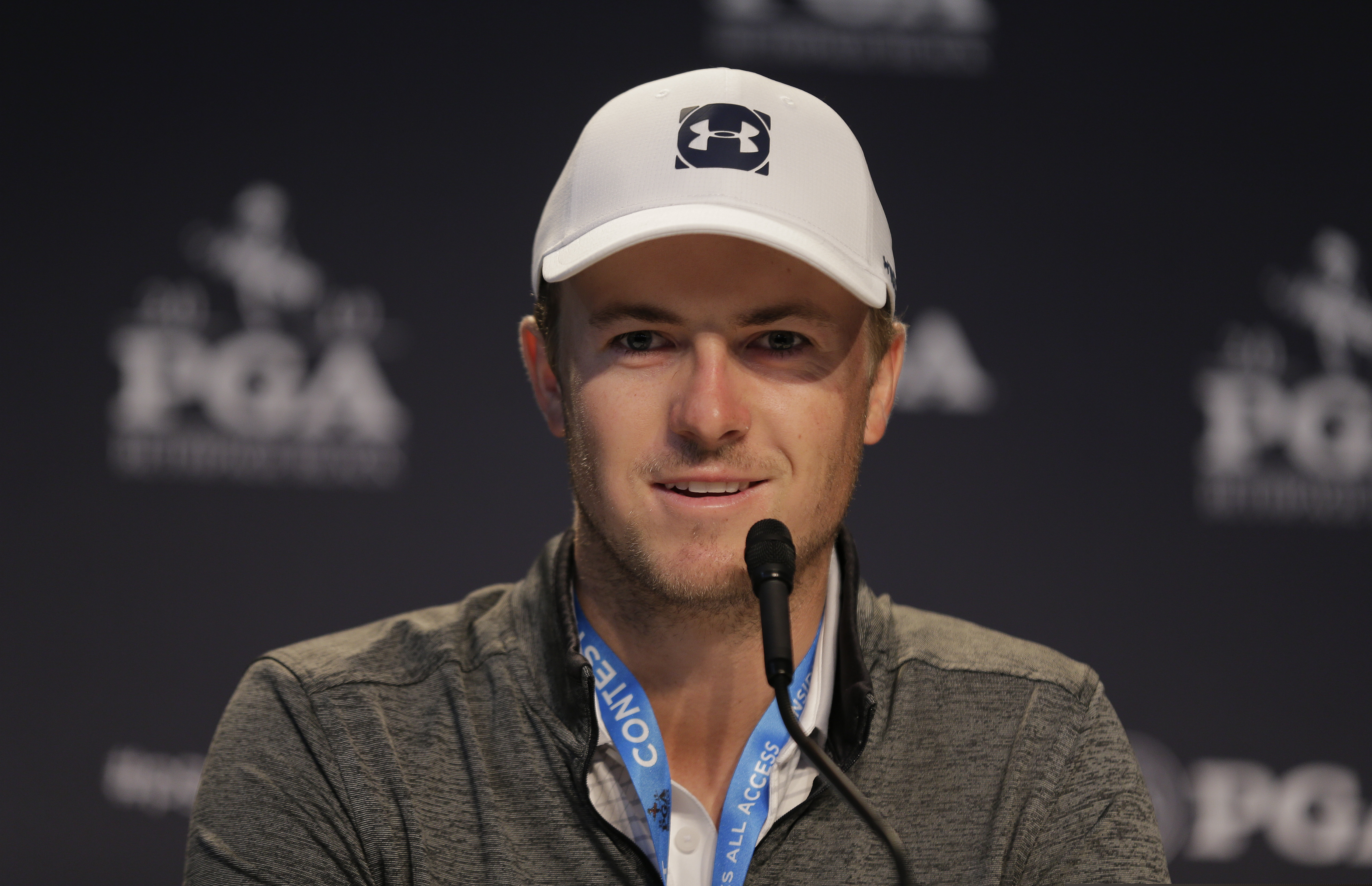 Jordan Spieth answers questions during a news conference before a practice round for the PGA Championship golf tournament, Wednesday, May 15, 2019, at Bethpage Black in Farmingdale, N.Y. (AP Photo/Seth Wenig)