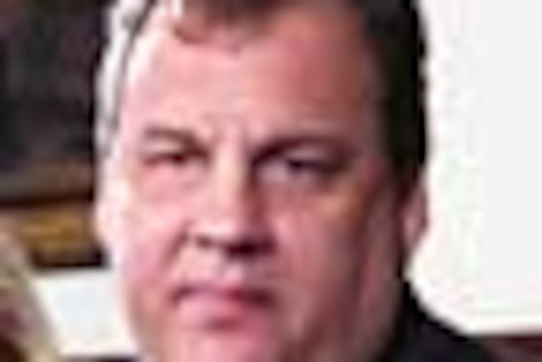 Gov. Chris Christie announces New Jersey's May employment numbers on Thursday, June 14, 2012 in Trenton, N.J. as Lt. Gov. Kim Guadagno looks on. Christie said New Jersey added 17,600 jobs in May. (AP Photo/Geoff Mulvihill)