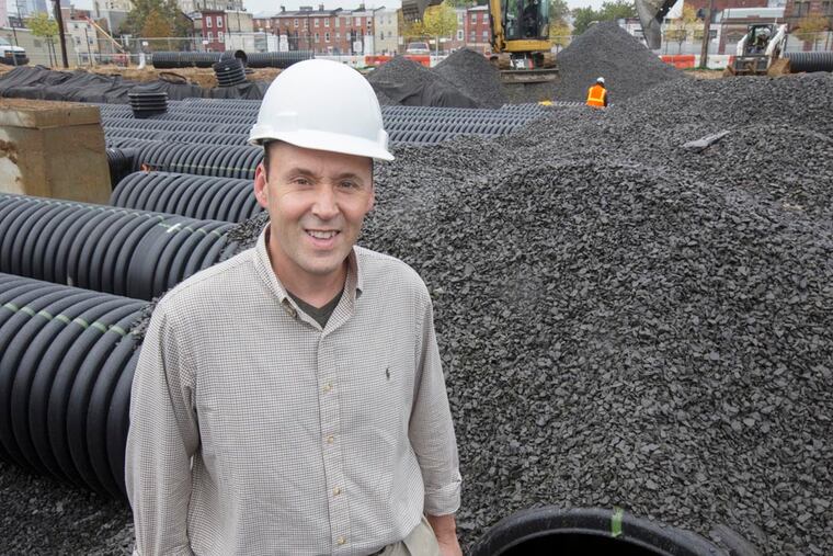 Louis A. Rodriguez, president of Rodriguez Consulting, is shown here in front of the storm water management system he designed for the Taj Deed Development Condos, located at 4th and Oxford Streets, in Philadelphia PA, Oct. 23, 2014. Staff Photographer / Jessica Griffin
