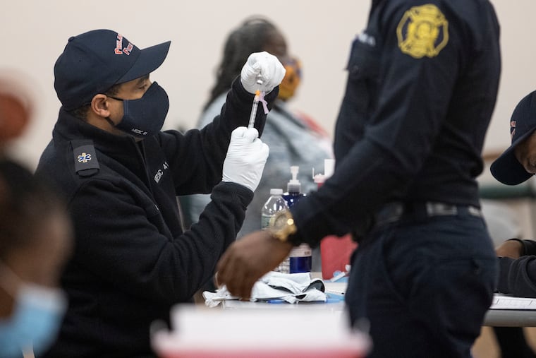 Philadelphia Fire Department EMS paramedics administered the Johnson & Johnson vaccine during a neighborhood clinic in West Oak Lane in March.
