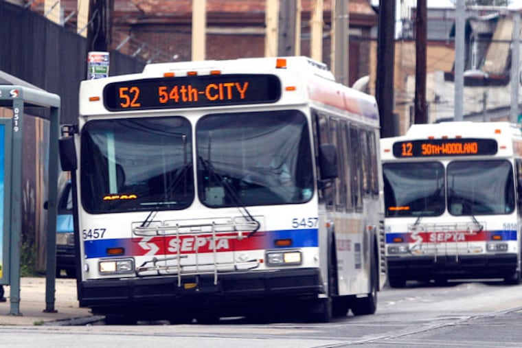 SEPTA buses along Woodland Avenue in West Philadelphia. (Yong Kim / Staff Photographer)