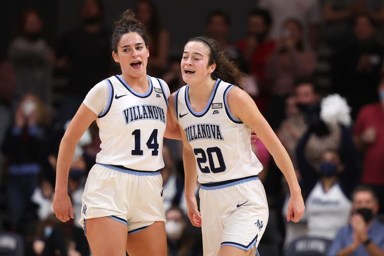 Brianna Herlihy (left) and Maddy Siegrist of Villanova celebrate during their victory against Marquette on Feb. 11.