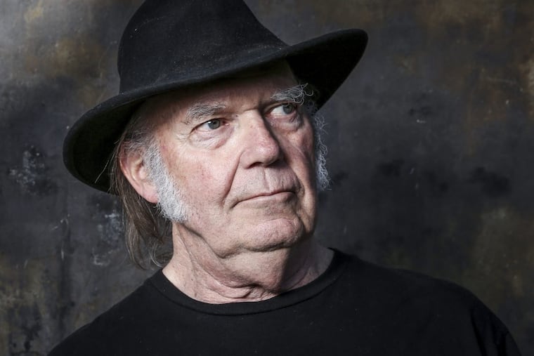 In this May 18, 2016, file photo, Neil Young poses for a portrait in Calabasas, Calif. Young announced on Nov. 11, 2017, he would open his vast archive of music for anyone to listen to online for free next month.