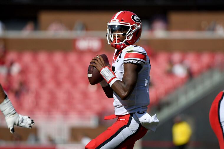 Quarterback D'Wan Mathis drops back to pass for Georgia against Arkansas in September.