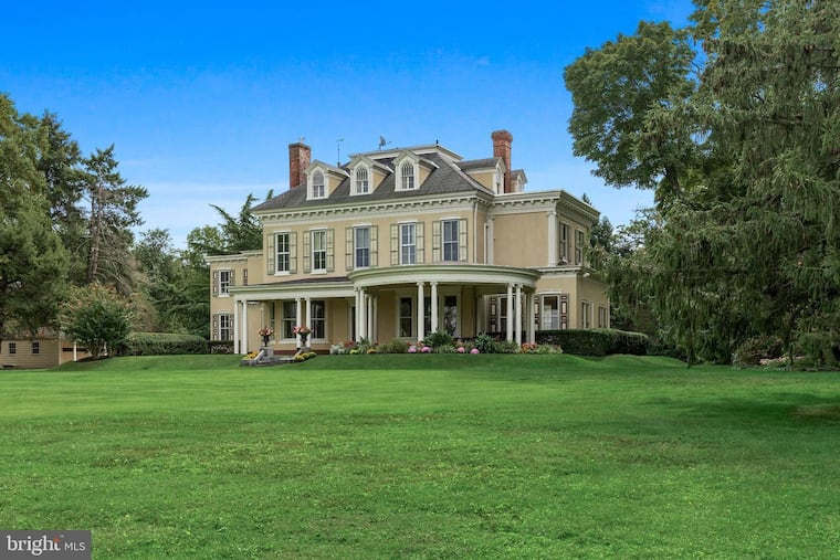 This house overlooking the Delaware River in a wooded neighborhood of Edgewater Park, N.J., is for sale. Asking price: $1.75 million.