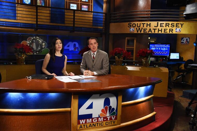 Former NBC40 news anchor Michelle Dawn Mooney, left, and weatherman Dan Skeldon offer up the 5 p.m. local news on the station on Dec. 23, 2014. The station lost its NBC license and was later went dark.