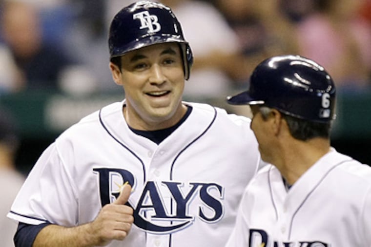 Fans and media in Tampa Bay are celebrating the release of Pat Burrell, who was a problem on and off the field for the Rays. (AP Photo/Chris O'Meara)