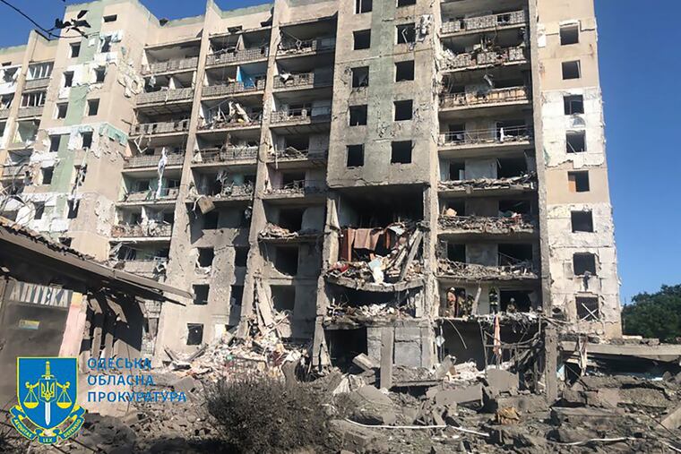 A damaged residential building is seen in Odesa, Ukraine, early Friday, July 1, 2022, following Russian missile attacks. Ukrainian authorities said Russian missile attacks on residential buildings in the port city of Odesa have killed more than a dozen people.
