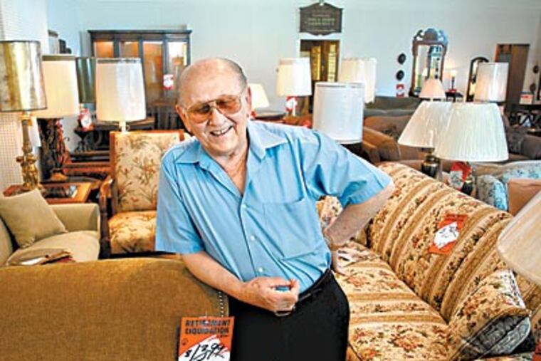 Henry Kramarski pauses at work in Kramarski’s Quality Furniture in Maple Shade, which he opened in 1967. (TOM GRALISH / Staff Photographer)