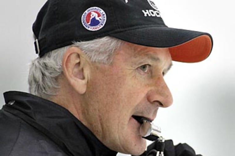 Phantoms coach Terry Murray watches opening day of training camp on Saturday. (Elizabeth Robertson/Staff Photographer)