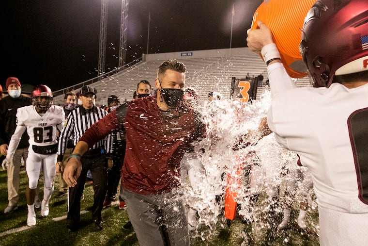 Coach Tim Roken celebrating one of St. Joseph’s Prep's state championships in 2020.