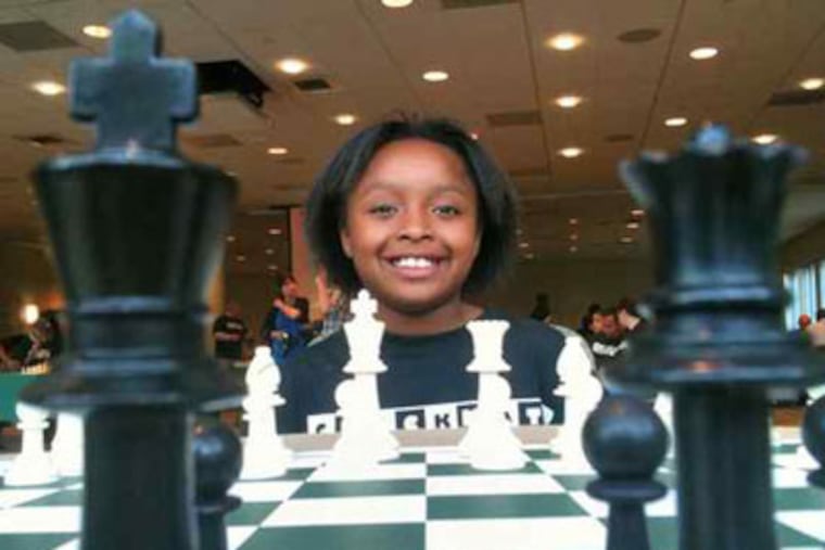 Janiya Ashlock , 9, beat Mayor Nutter at chess in the opening match. Nutter held out 45 minutes until only his king was left. (Robert Moran / Staff)