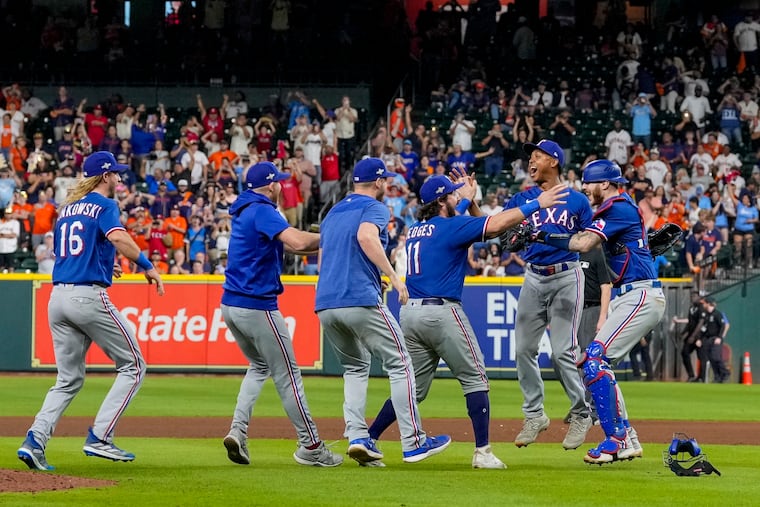 The Texas Rangers celebrate after winning Game 7 of the ALCS Monday night. It was their second-ever Game 7 appearance. The Phils wouldn't mind a similar experience Tuesday night.
