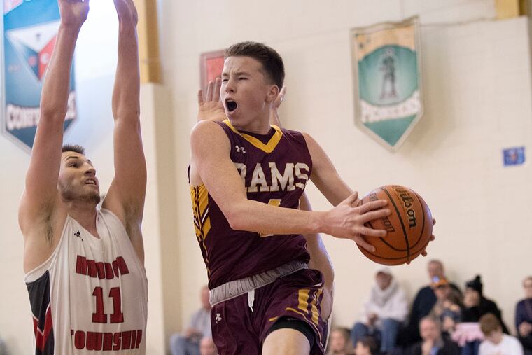 Gloucester Catholic's Conor Regan, here driving against Haddon Township's Eric Shuttleworth, is the Rams' all-time leader with 203 career three-pointers.