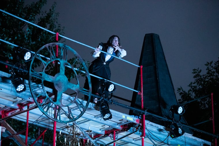 A cast of 60, most of them Norristown residents, will perform their version of "Our Town," called Town, in conjunction with Theatre Horizon in Norristown. Sarah Glerko on the top of the multi-level stage outside of Eisenhower Science and Leadership Technology during a rehearsal last week.