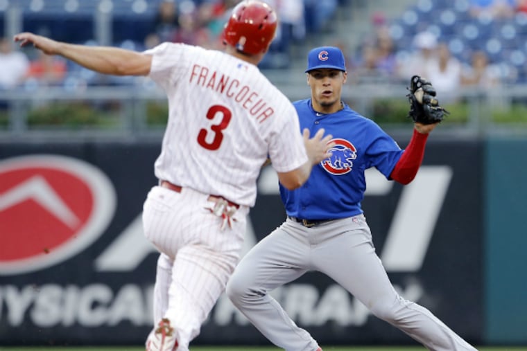 Jeff Francoeur gets forced out at second base in the fourth inning of Game 1 of last night’s doubleheader against the Cubs. He finished the game with a pair of singles.