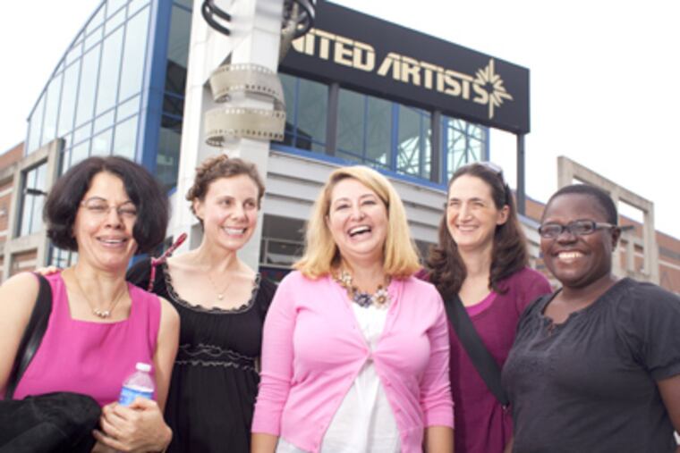 Outside the United Artists theater in Manayunk, working mothers who saw the film "I Don't See How She Does It." They are (from left) Farha Ghannam, Jill Brook, Lisa McElroy, Cassie Ehrenberg, and Kim Mutcherson. (Ed Hille / Staff Photographer)